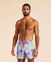 Men Stretch Swim Trunks Tortues Multicolores Flax flower front worn view