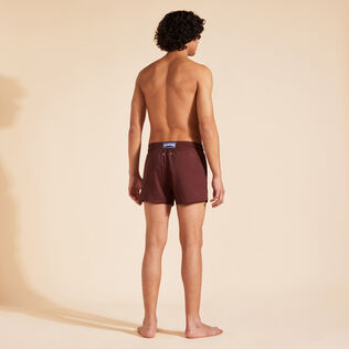 Men Swimwear Short and Fitted Stretch Solid Mahogany back worn view