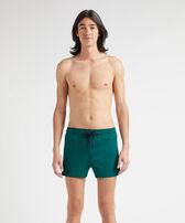 Men Swimwear Short and Fitted Stretch Solid Ivy front worn view