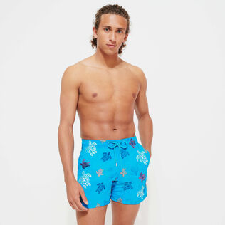 Men Swim Shorts Embroidered Ronde Des Tortues - Limited Edition Lazuli blue front worn view