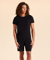 Camiseta de color liso en tejido terry unisex Negro vista frontal desgastada