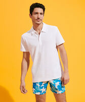 Polo de color liso en tejido jacquard para hombre Blanco vista frontal desgastada