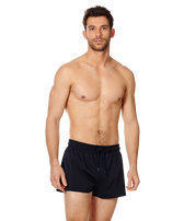 Men Swimwear Short and Fitted Stretch Solid Black front worn view