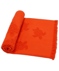 Telo da spiaggia in cotone organico Turtles Jacquard Rust vista frontale indossata