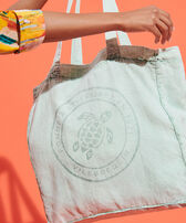 Bolso tote unisex de lino con tinte mineral y estampado Turtle Agua verde mujeres vista frontal desgastada