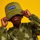 Kids Reversible Bucket Hat Ronde des Tortues Camo Khaki front worn view Kids Reversible Bucket Hat Ronde des Tortues Camo Khaki front worn view
