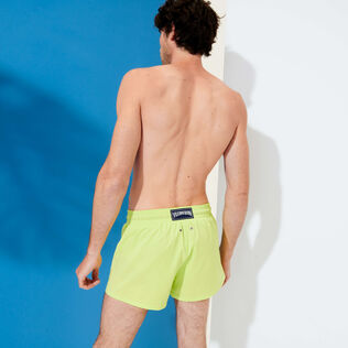 Men Swim Trunks Solid Coriander back worn view