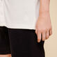 Camisa de bolos lisa en tejido terry unisex Blanco tiza detalles vista 2