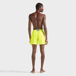 Men Ultra-Light and Packable Swim Trunks Solid Neon yellow back worn view
