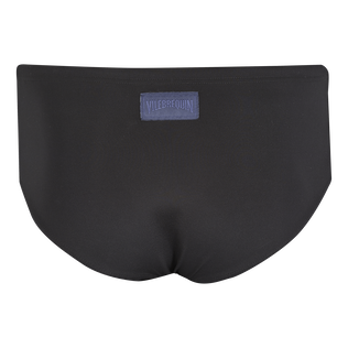 Bañador slip ajustado de color liso para hombre Negro vista trasera