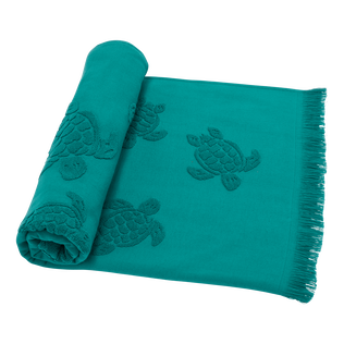 Toalla de playa en algodón orgánico Turtles Jacquard Linden vista frontal desgastada