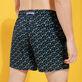 Men Ultra-light and packable Swim Trunks Micro Tortues Rainbow Navy back worn view