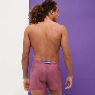 Men Swim Trunks Short and Fitted Stretch Solid Murasaki back worn view