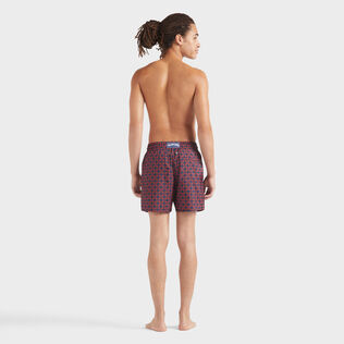 Pantaloncini mare uomo ultraleggeri e ripiegabili Homard Pixel Blu marine vista indossata posteriore
