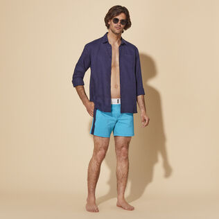 Pantaloncini mare uomo elasticizzati con cintura piatta Color Block Blu curacao dettagli vista 1