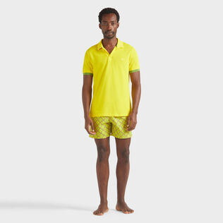 Polo en piqué coton organique homme uni Soleil vue portée de face
