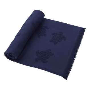 Serviette de plage fouta uni en coton biologique jacquard tortues Bleu marine vue portée de face