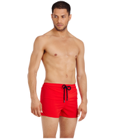 Men Swimwear Short and Fitted Stretch Solid Medicis red front worn view