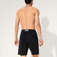 Unisex Terry Bermuda Solid Black back worn view