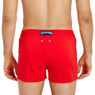 Men Swimwear Short and Fitted Stretch Solid Medicis red details view 1