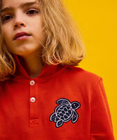 Boys Cotton Polo Turtle Patch Tomato front worn view