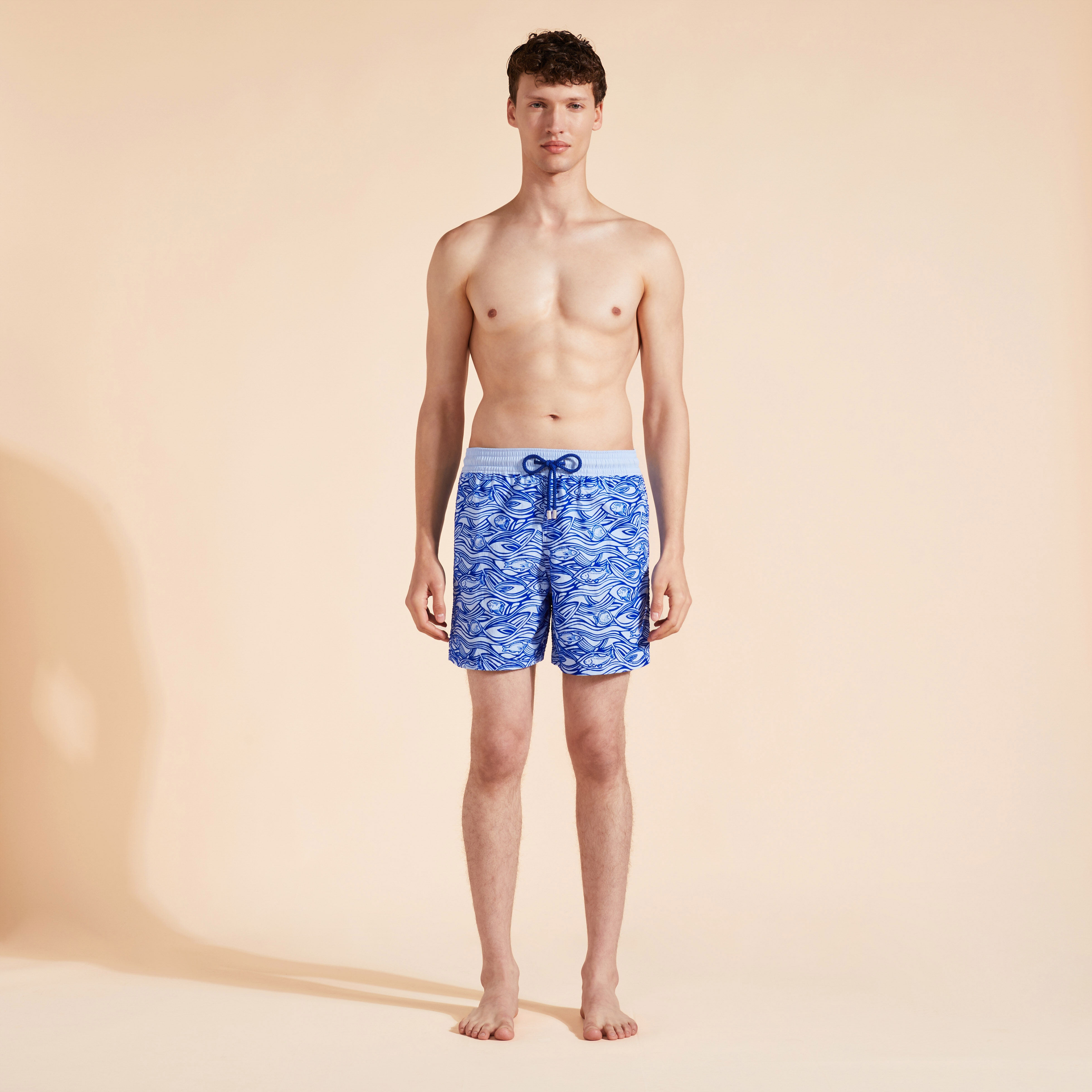 Man in swimming trunks clearance