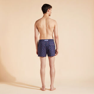 Men Stretch Swim Trunks Micro Ronde Des Tortues Rainbow Navy back worn view