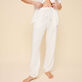 Pantalón liso en tejido terry unisex Blanco tiza detalles vista 2