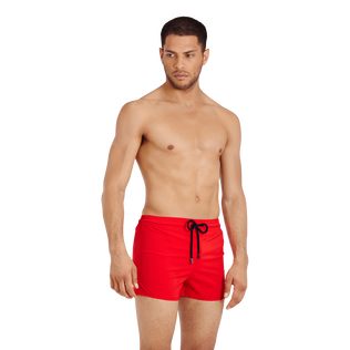Men Swim Trunks Solid Medicis red front worn view