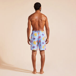 Men Long Stretch Swim Trunks Tortues Multicolores Flax flower back worn view