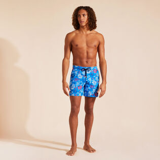 Men Swim Shorts Embroidered Tropical Turtles - Limited Edition Neon blue front worn view