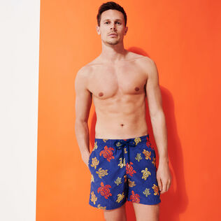 Men Embroidered Swim Trunks Ronde Des Tortues - Limited Edition Purple blue front worn view