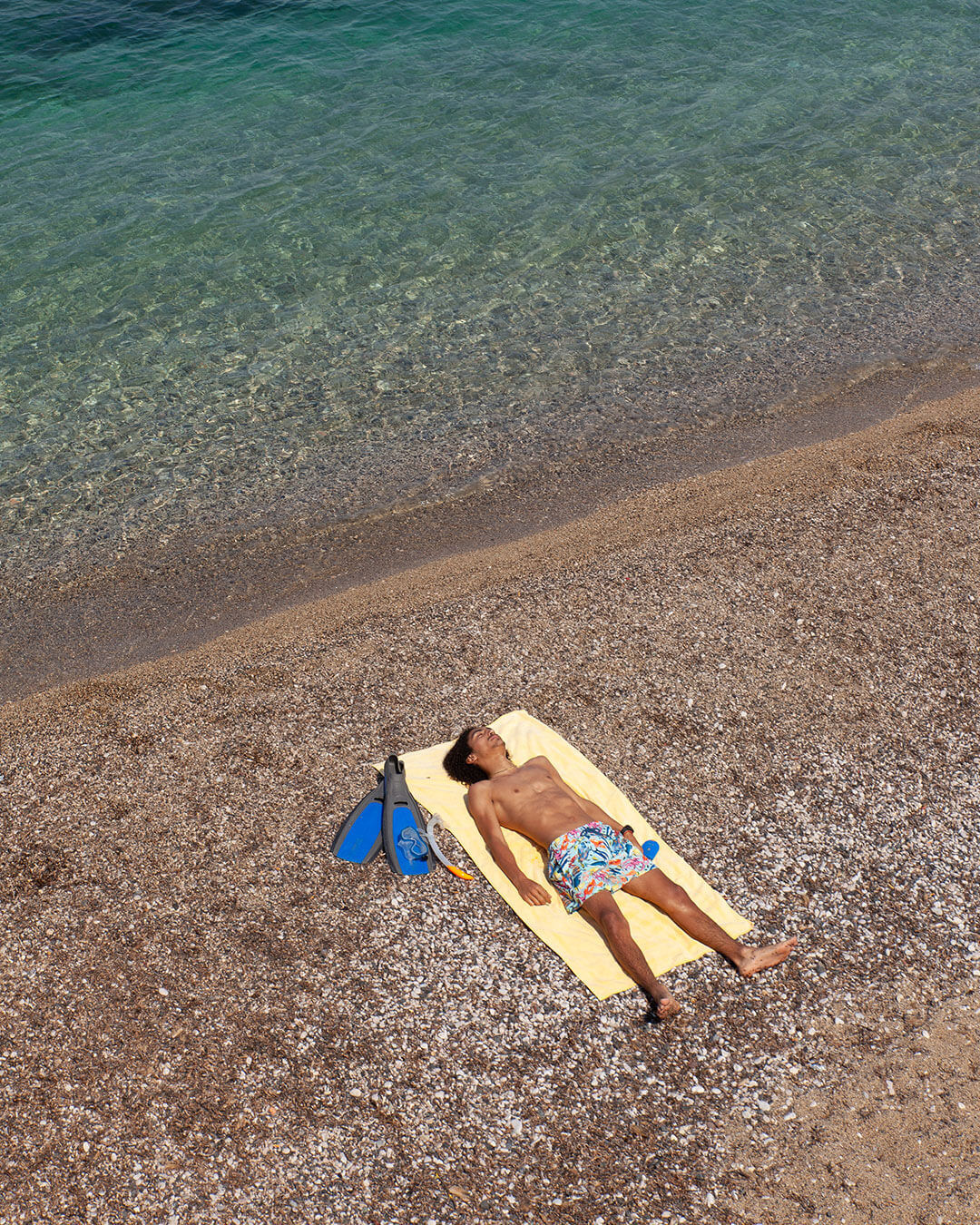 Man lying on a beach