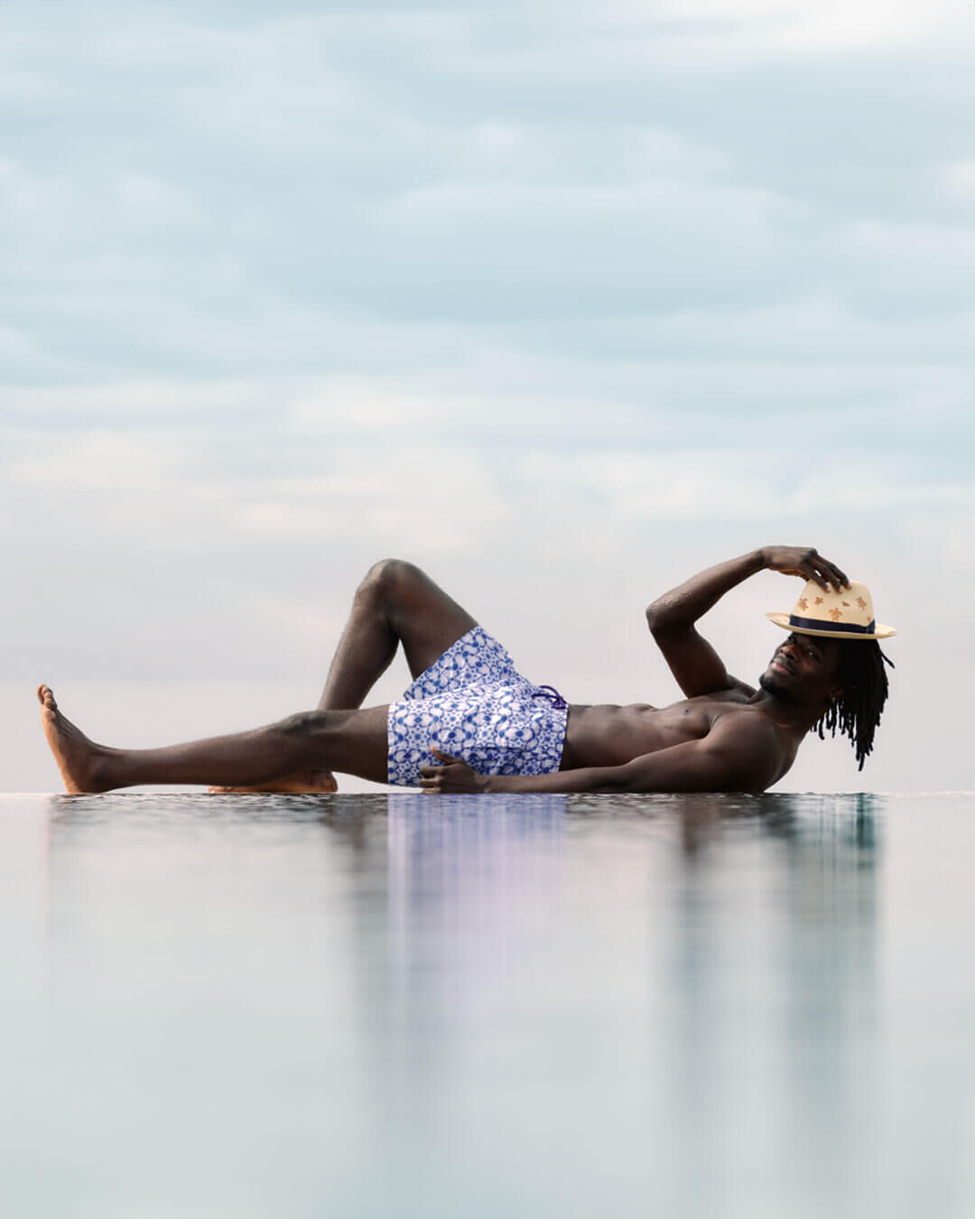A man by a pool