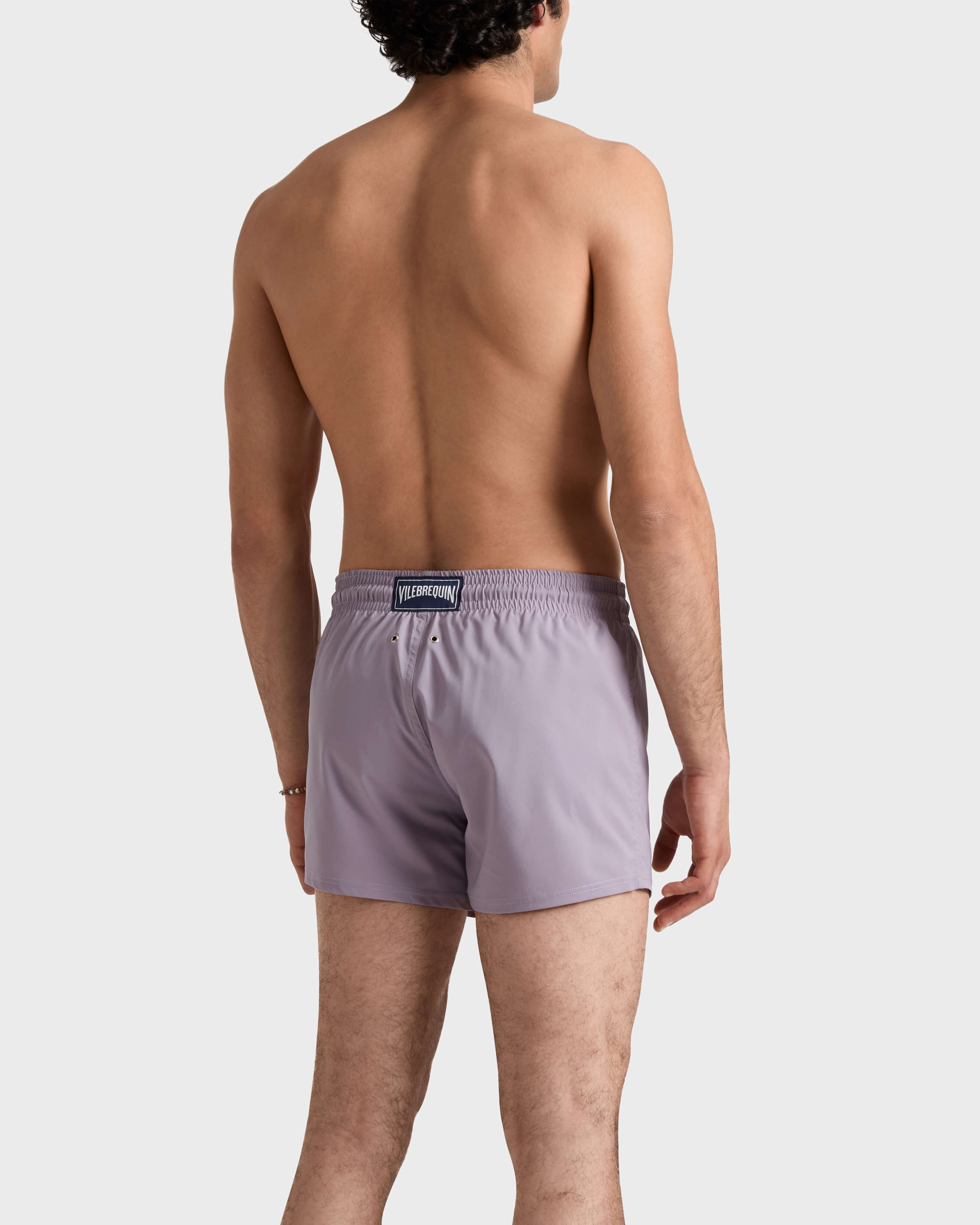 Costume da bagno corto uomo stretch e aderente a tinta unita OURAGAN backworn view