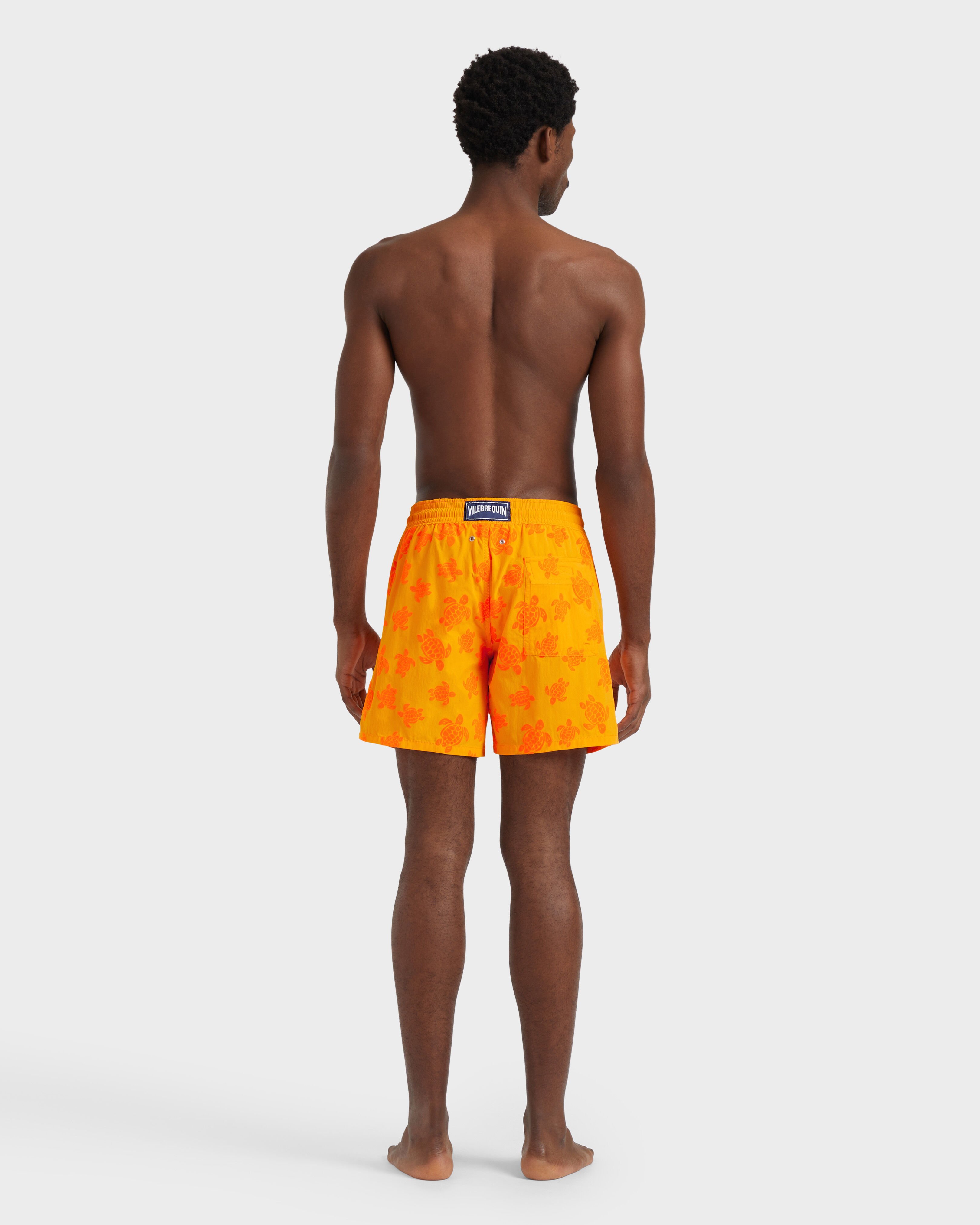 Men Swim Shorts Flocked Rondes Des Tortues MANGO backworn view