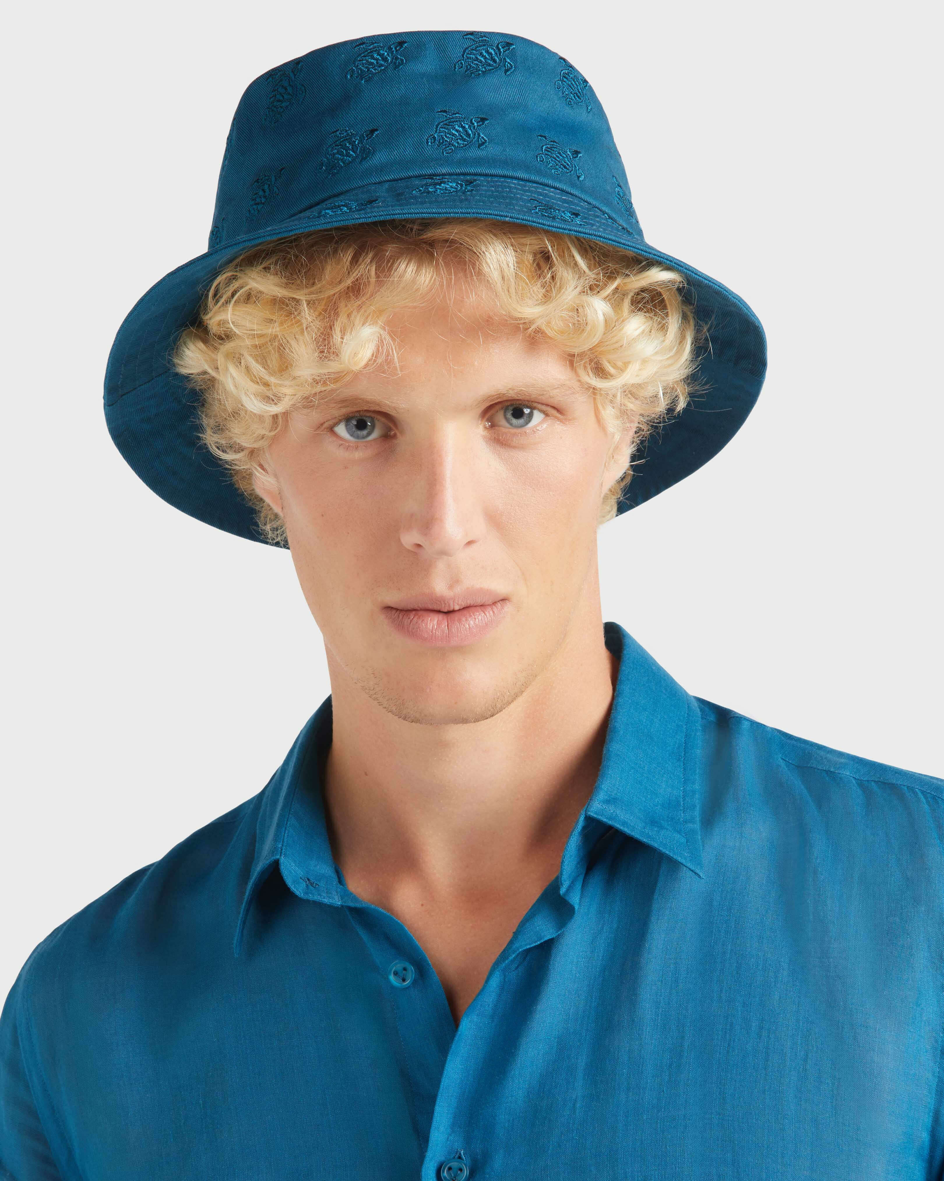 Embroidered Bucket Hat Turtles All Over PEACOCK frontworn view