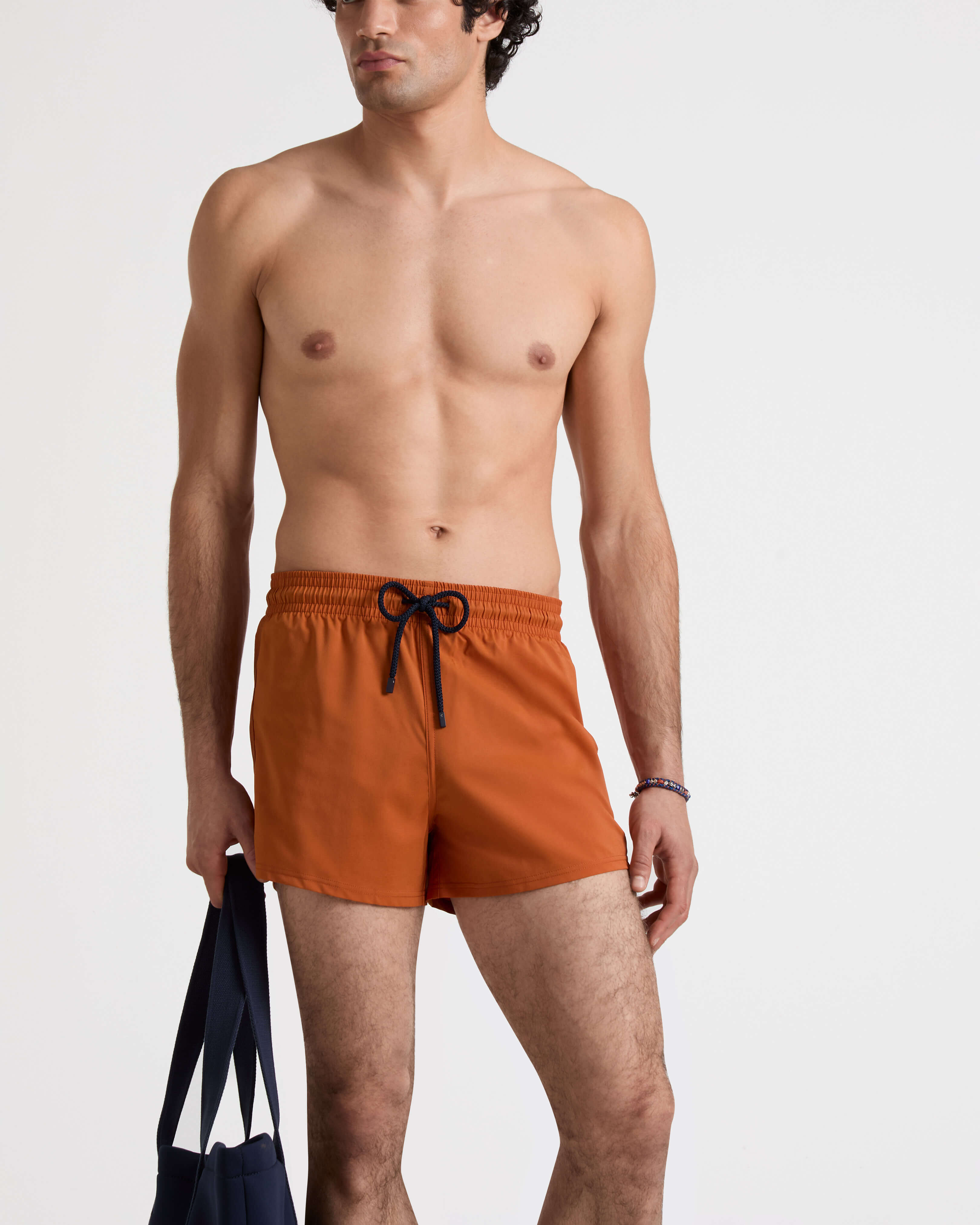 Men Swimwear Short and Fitted Stretch Solid PAPRIKA frontworn view