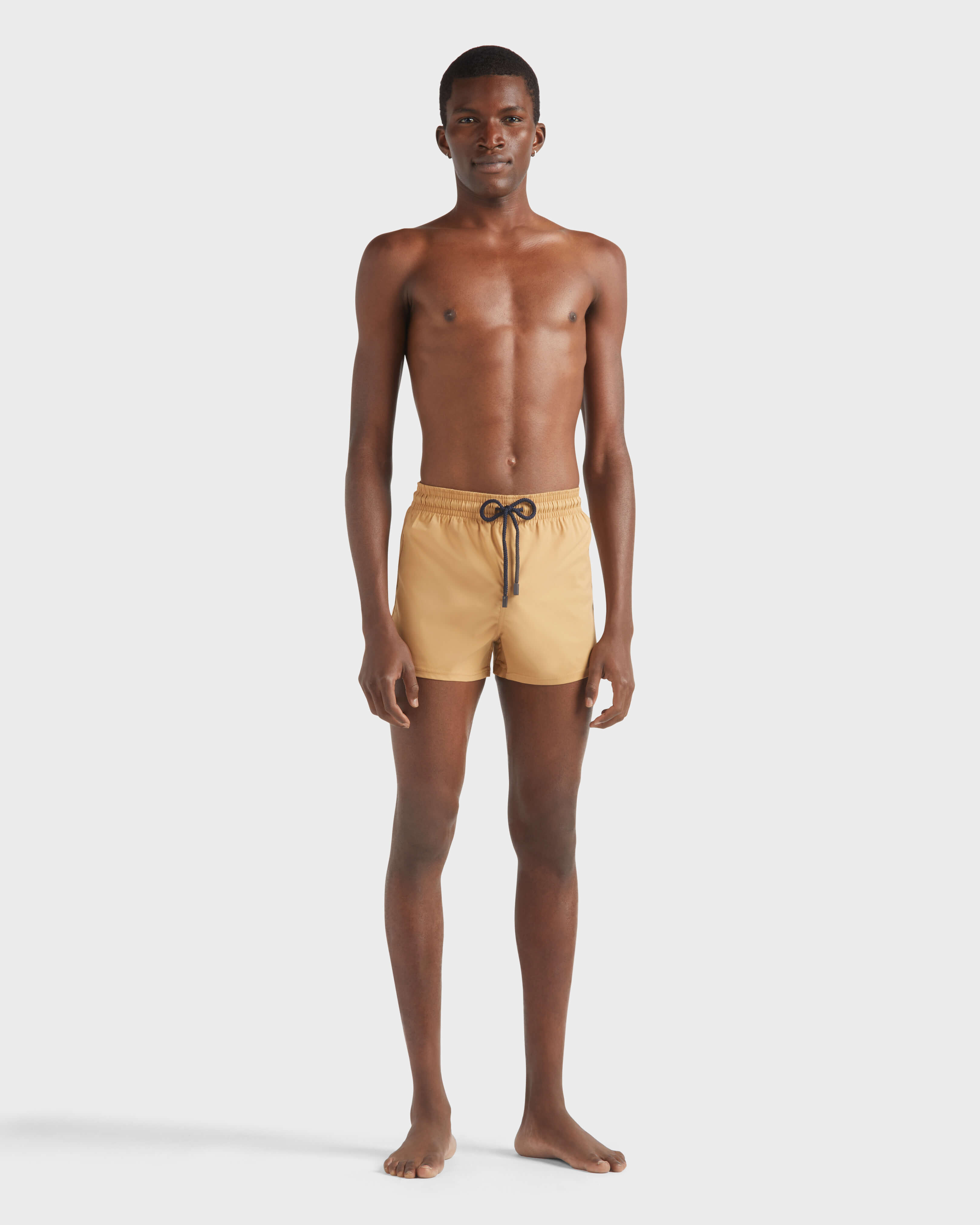 Men Swimwear Short and Fitted Stretch Solid MOCHA frontworn view