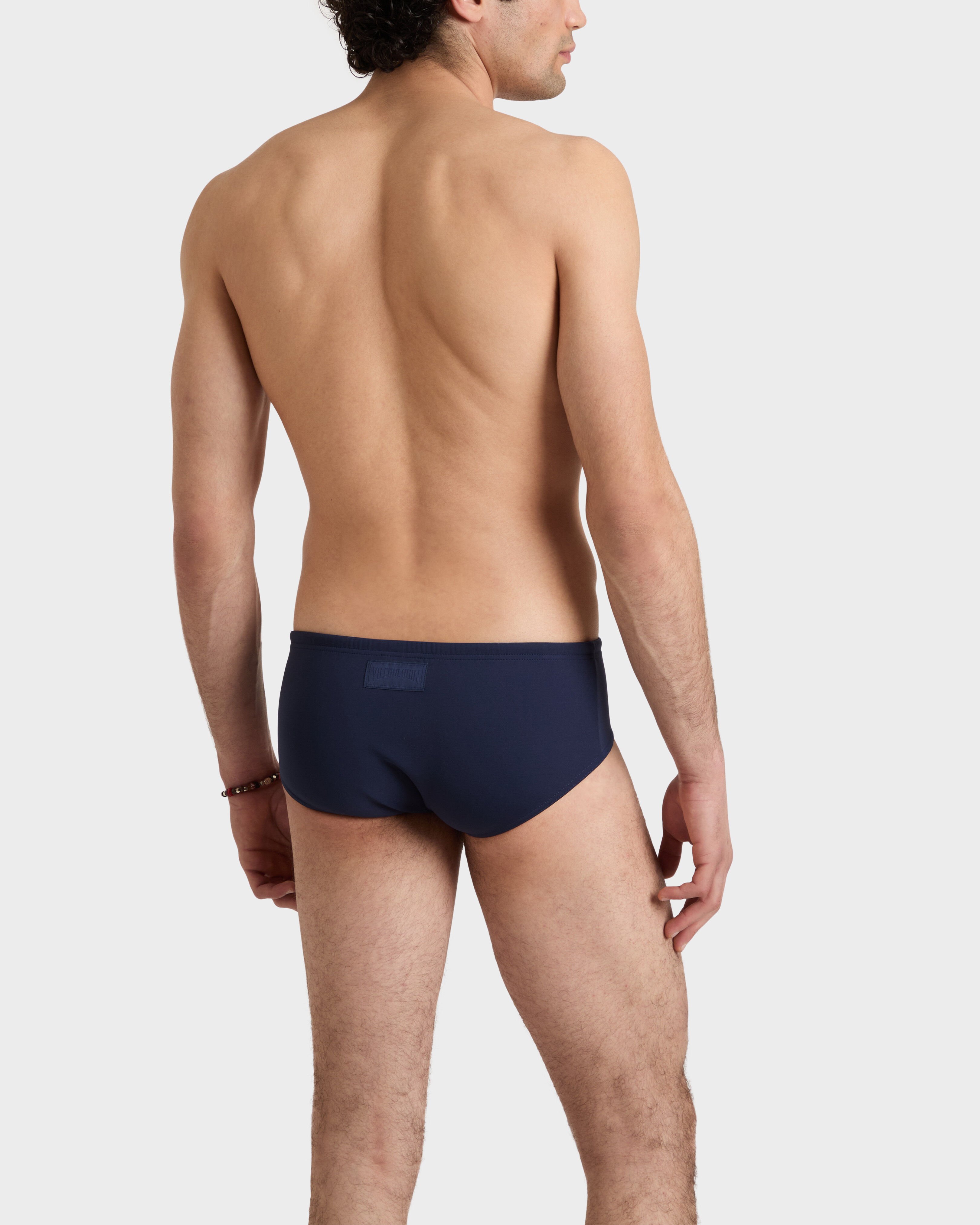 Slip mare uomo aderenti a tinta unita BLU MARINE backworn view