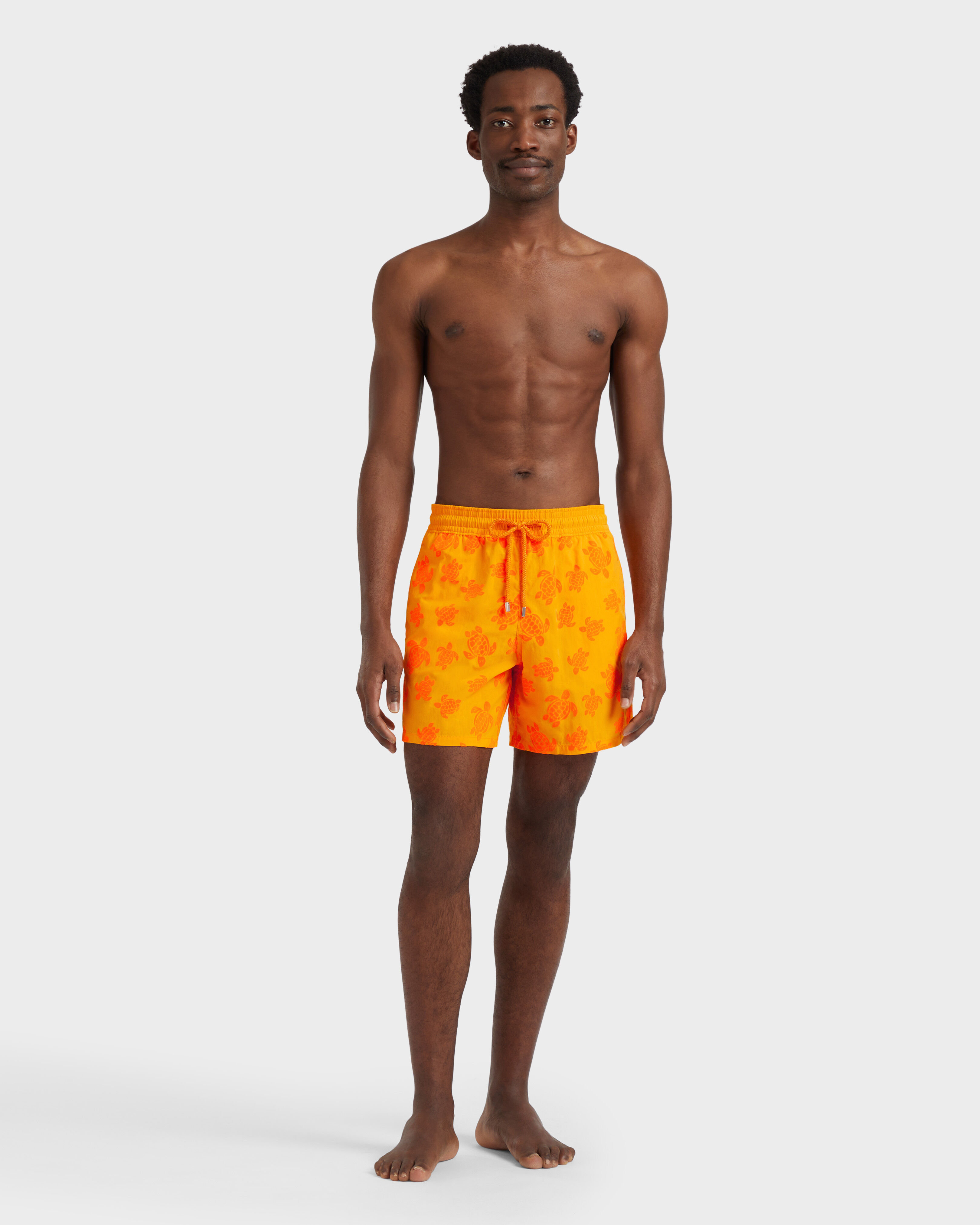 Men Swim Shorts Flocked Rondes Des Tortues MANGO frontworn view