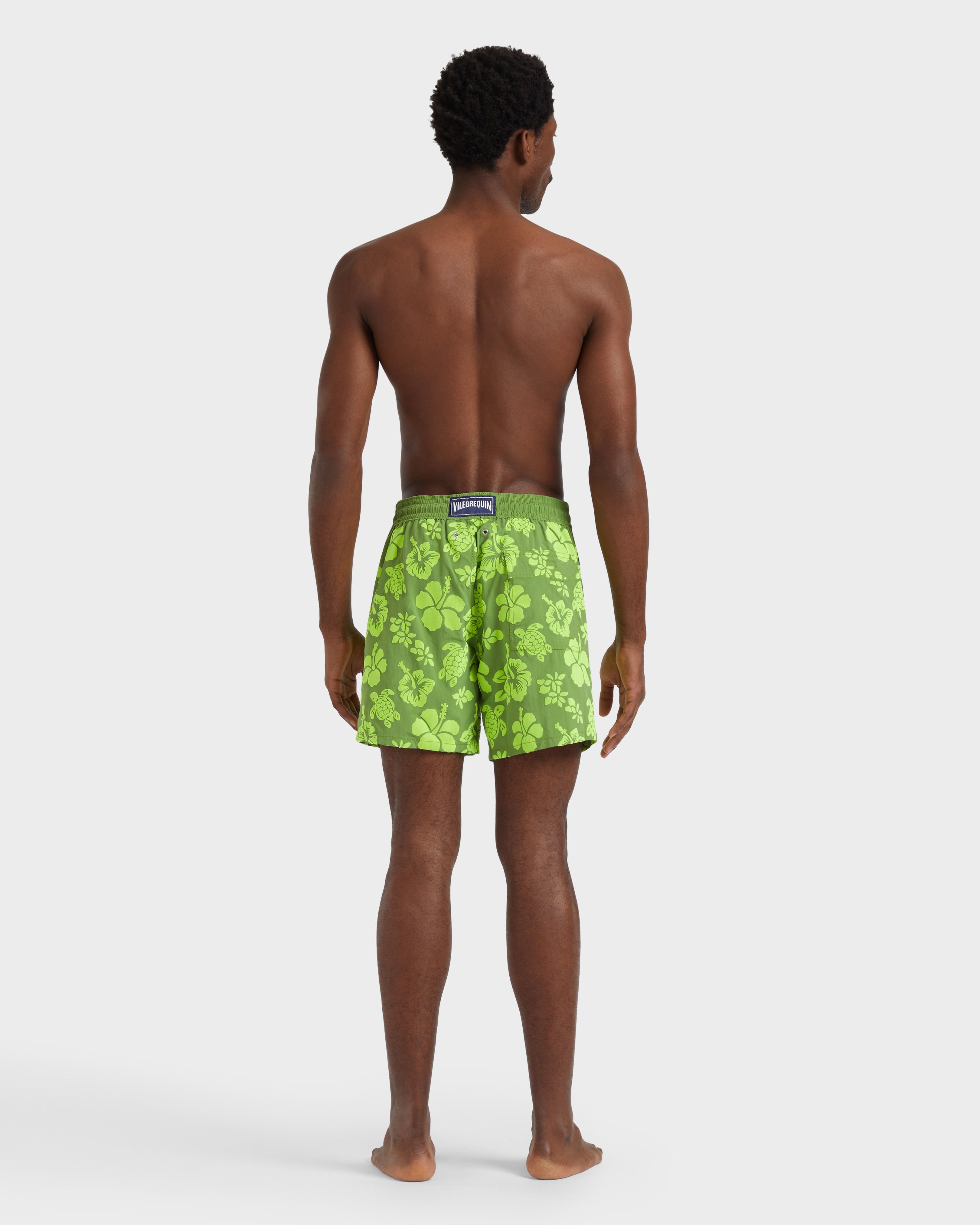 Men Swim Shorts Flocked Tropical Turtles CAMOUPLAGE backworn view