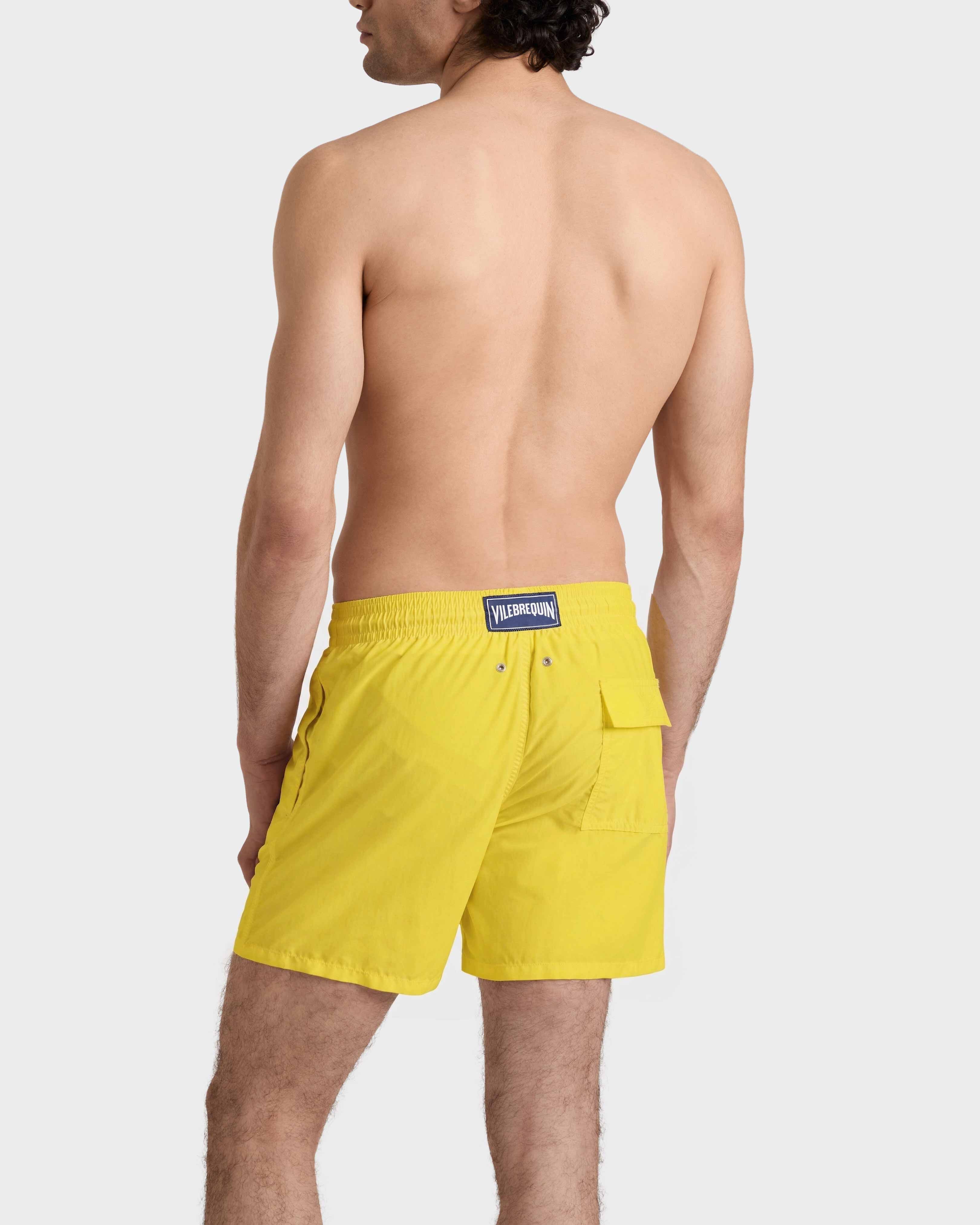 Bañador de color liso para hombre SOL backworn view