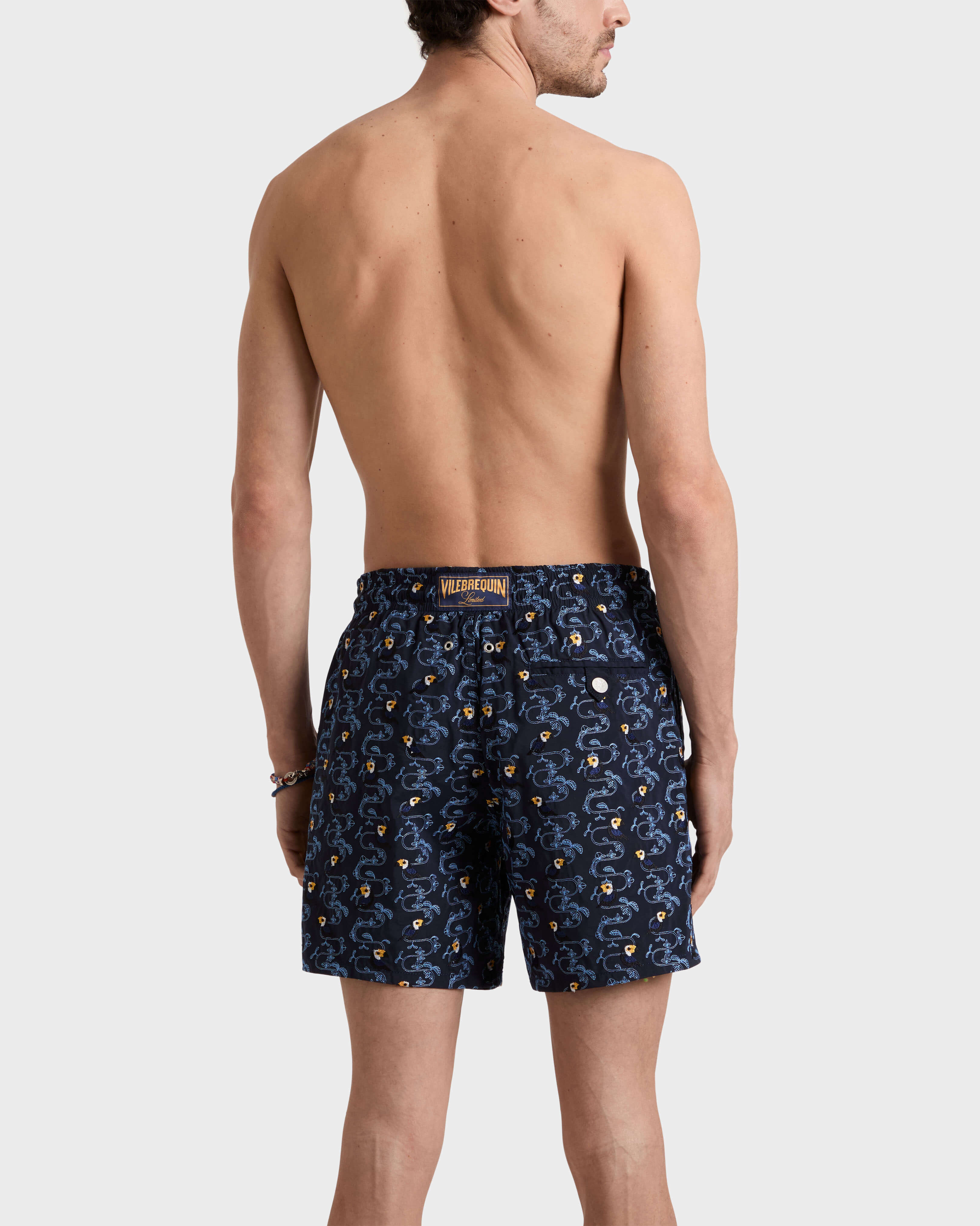 Pantaloncini mare uomo ricamati Toucana - Edizione limitata BLU MARINE backworn view