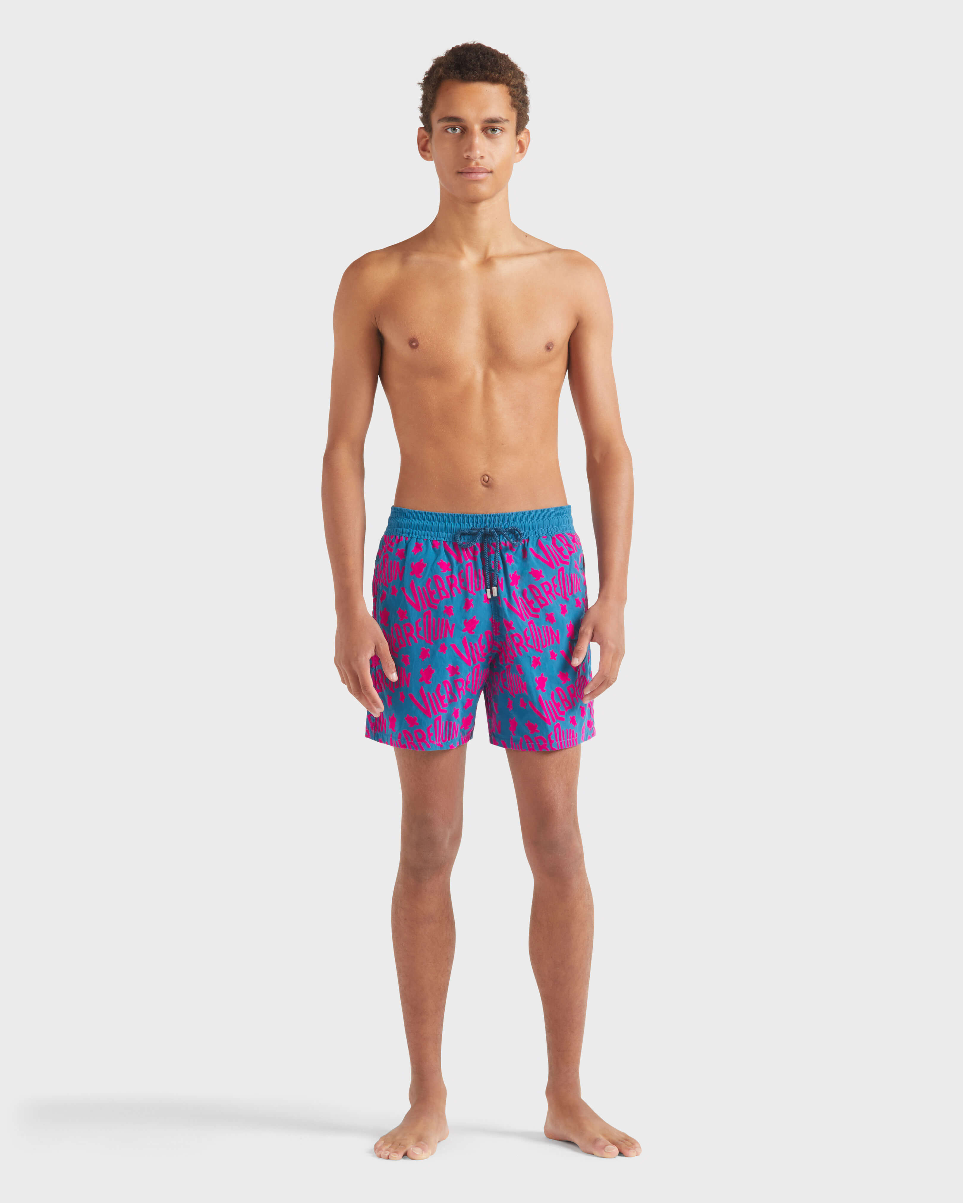 Men Swim Trunks Flocked Ronde Des Tortues Logo PEACOCK frontworn view