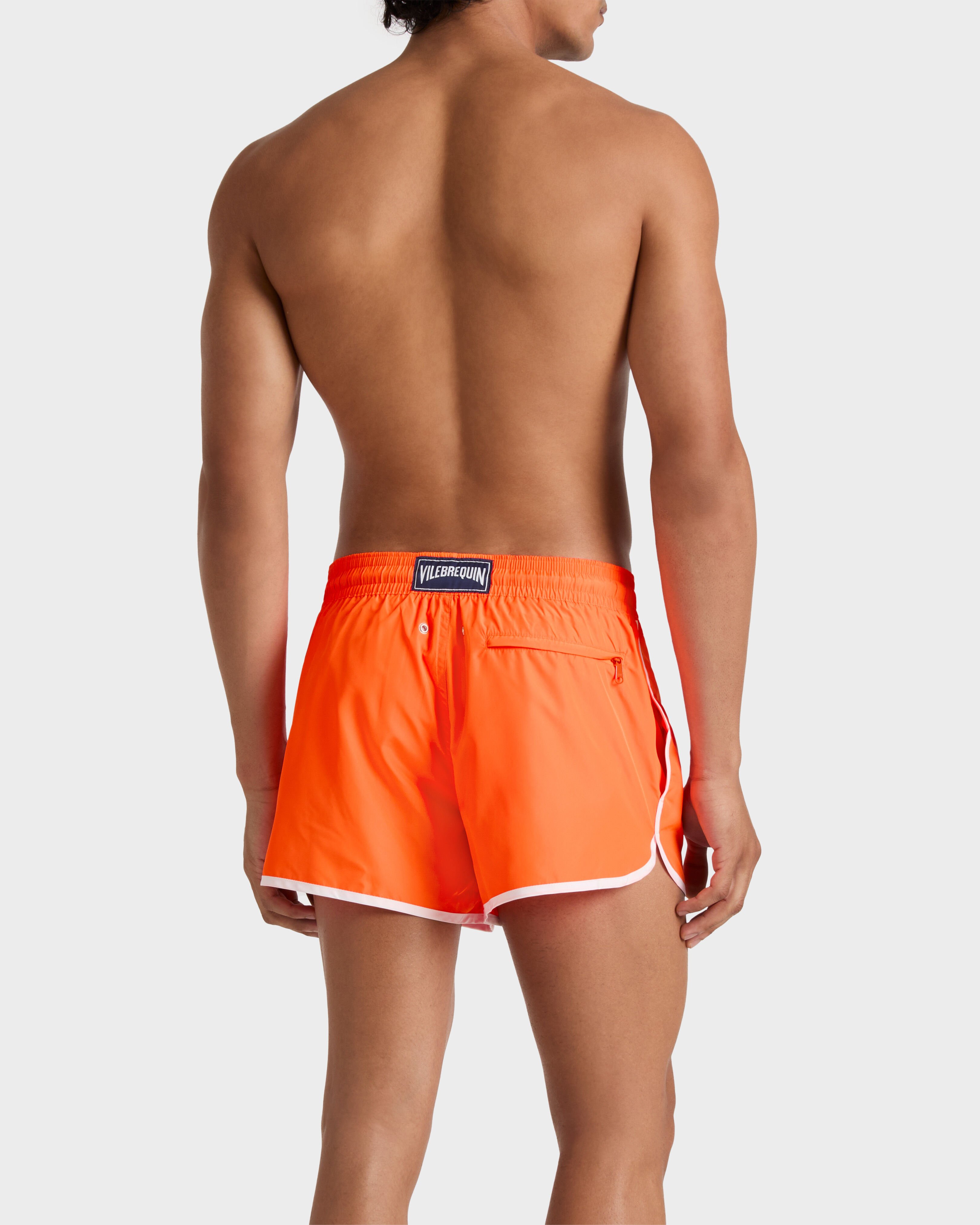 Maillot de bain homme court ultra-léger uni FLUO FIRE backworn view