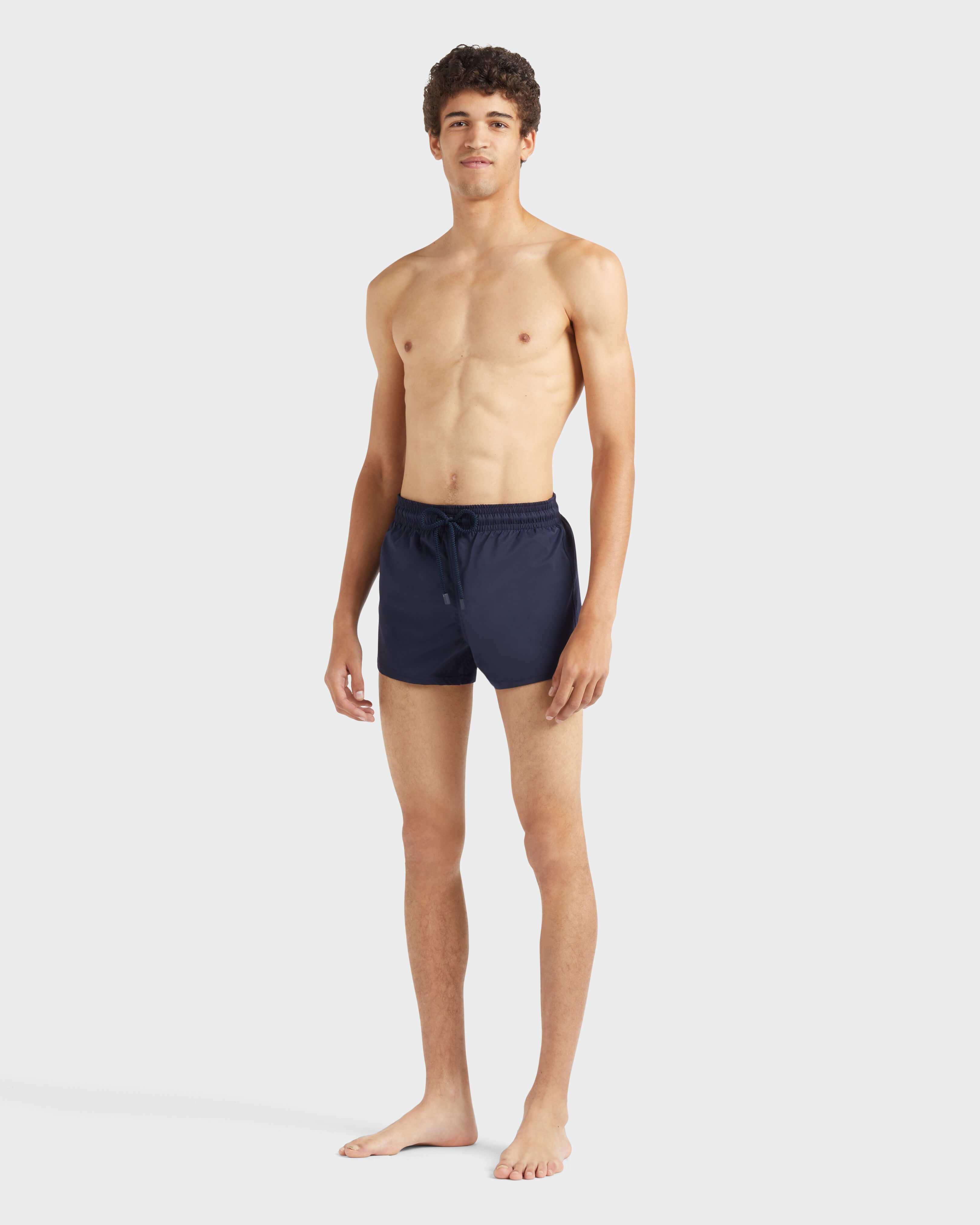 Men Swimwear Short and Fitted Stretch Solid NAVY frontworn view