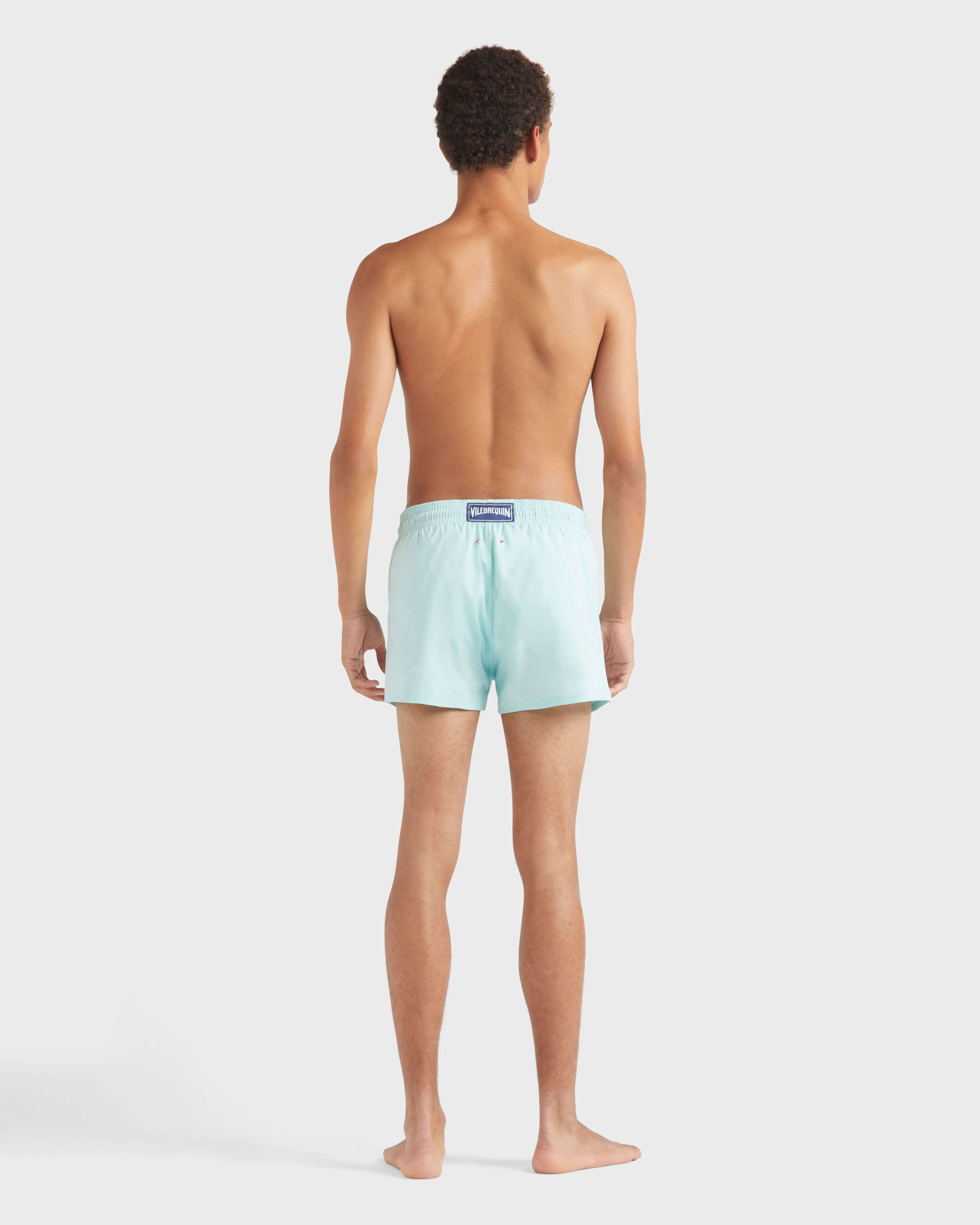 Men Swimwear Short and Fitted Stretch Solid PACIFIC backworn view