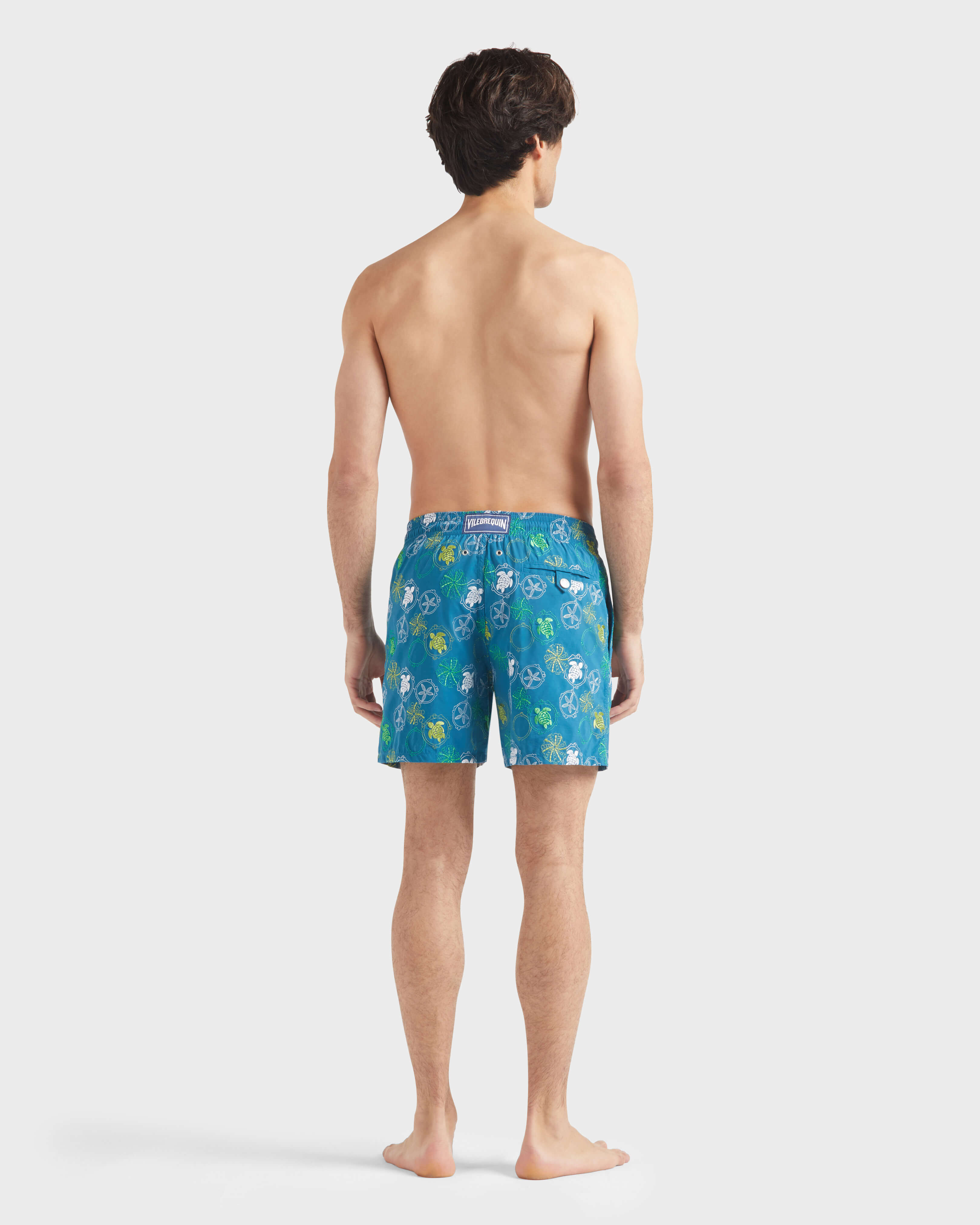 Men Swim trunks Embroidered Oursins PEACOCK backworn view