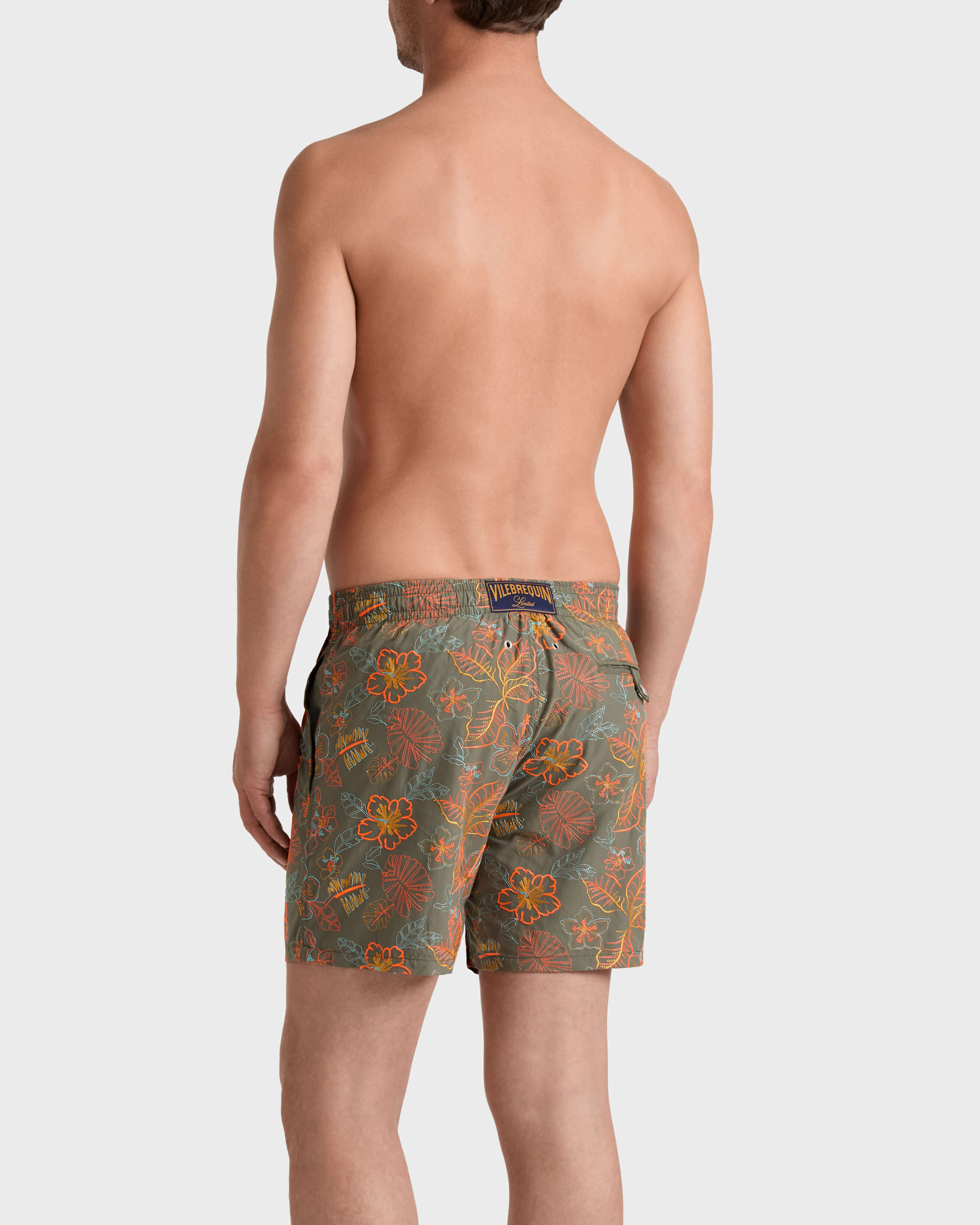 Pantaloncini mare uomo ricamati Island Flowers - Edizione limitata OLIVIER backworn view